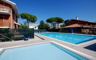 Modern and comfy holiday apartment with pool view Apartment in Lignano Sabbiadoro
