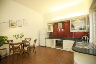 XOI Mira1_Lakeside Garden Villa_Kitchn_Laundry@CBD Vacation rental in Laos