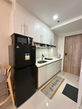 Cozy unit w/ pool and gym near mactan airport Vacation rental in Lapu-Lapu City