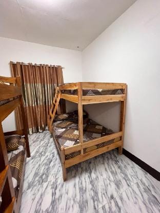 JAI Guesthouse by Honda Bay Rm 3 Vacation rental in Puerto Princesa