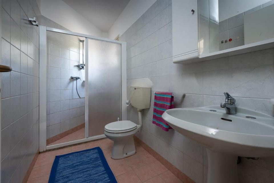 Cozy villa with private fenced garden and pool Apartment in Bibione