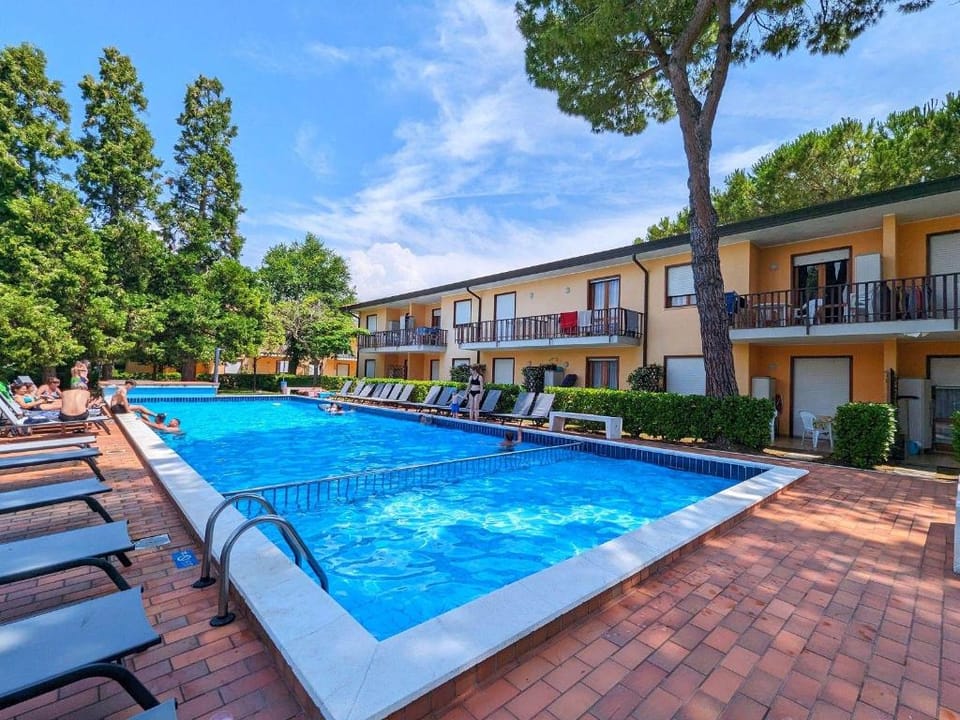 Stylish apartment with garden and outdoor pool Apartment in Bibione