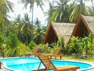 Lucy's Garden Hotel Campground/ 
RV Resort in Pemenang
