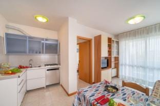 Opulent Apartment with Panoramic Terrace by Beahost Rentals Apartment in Bibione
