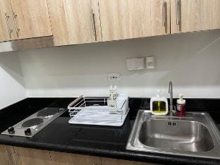 Cozy Condo Near Mall of Asia w Balcony & HotShower Vacation rental in Pasay