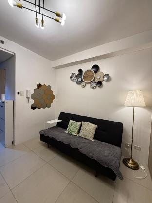 Double-sized Bed @ Adlaw Suite Mall of Asia Pasay Vacation rental in Pasay