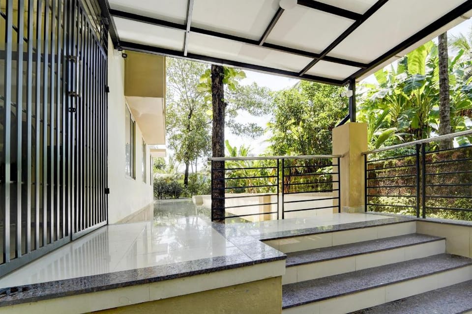 Super Collection O Calicut Near Calicut Medical College Hotel in Kozhikode