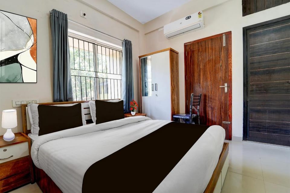Super Collection O Calicut Near Calicut Medical College Hotel in Kozhikode