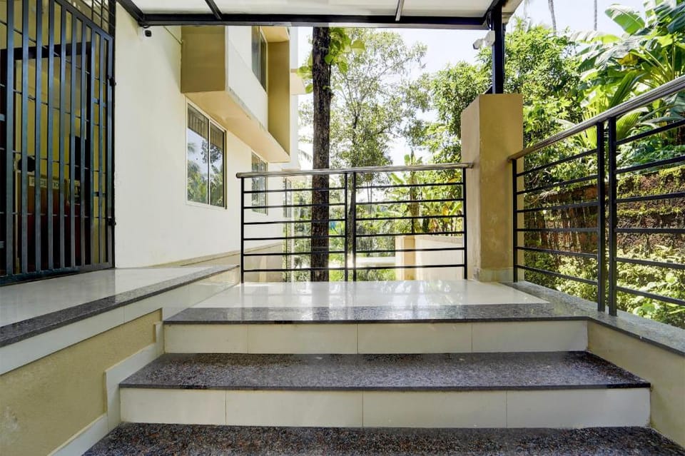 Super Collection O Calicut Near Calicut Medical College Hotel in Kozhikode