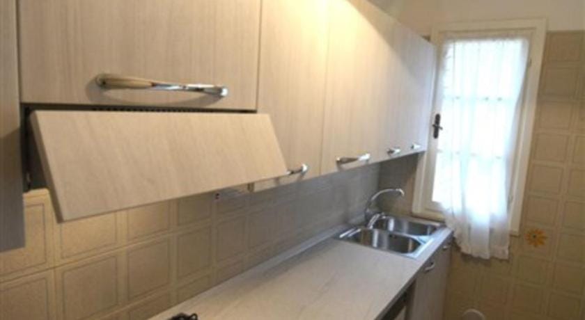 Cozy flat with private fenced garden a few steps from Lignano Sabbiadoro beach Apartment in Bibione