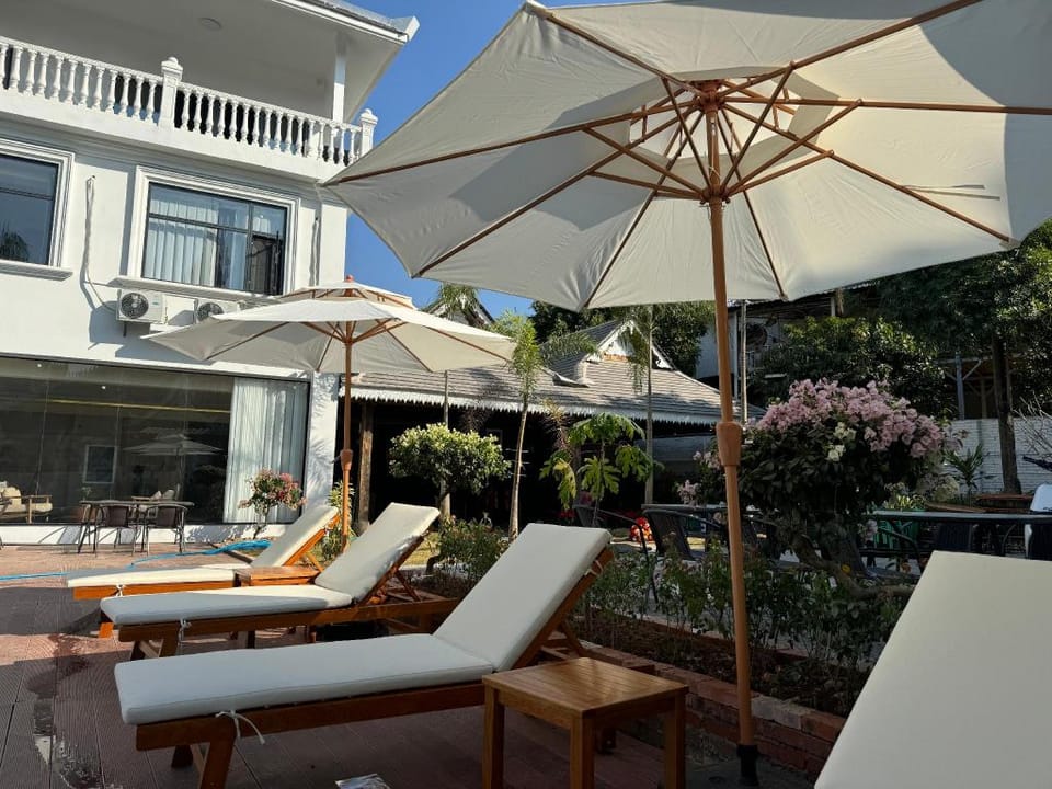 景洪·尘朵南山·曼真小院轻奢度假美宿(嘎洒国际机场店) Hotel in Laos