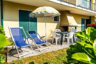 Townhouse with garden and pool in Bibione Apartment in Bibione