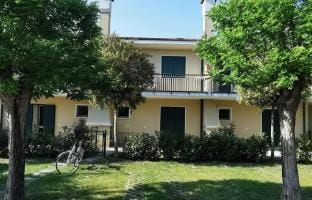 Townhouse with garden and pool in Bibione Apartment in Bibione