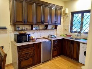 1BHK Haven Amidst Nature in Villa Palmas, Arpora Apartment in Baga
