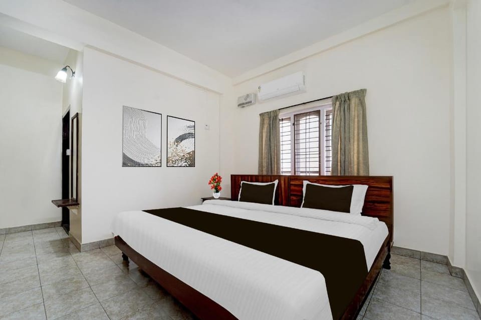 Super Hotel O Pathanamthitta Near Mahatma Gandhi Statue Hotel in Kerala