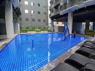 A large bedroom in S Residence 22-8 by jamez Vacation rental in Pasay