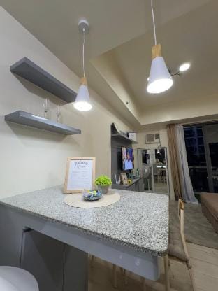 Cozy MOA Staycation – Fast WiFi, Pool & Balcony Apartment in Pasay