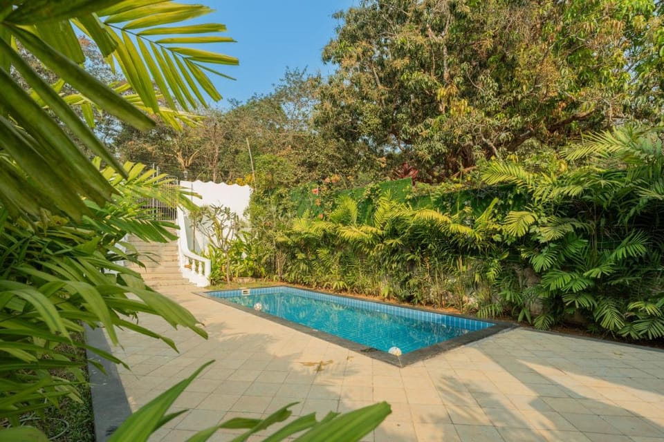 ELIVAAS Maison 10 - Luxe 4 BHK Villa With Pvt Pool Vacation rental in Goa, India