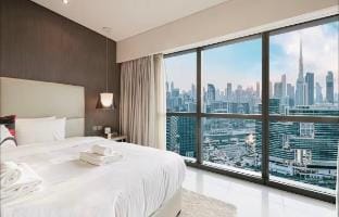 5 Star 2BR Burj Khalifa views from room pool & Gym Apartment in Dubai