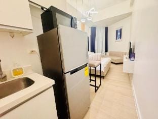 Dimple's Nest at Azure | Wifi | Pet OK | Cook OK Apartment in Calabarzon