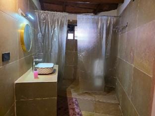 Little Earth - Kerala Style Mud House with Pool Farm Stay in Hyderabad
