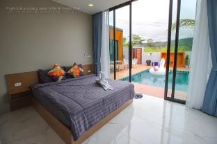บ้านกลางใจเขาพูลวิลล่า  Villa in Laos