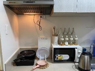 1BR w/ PS4 & Balcony Pool View Vacation rental in Quezon City