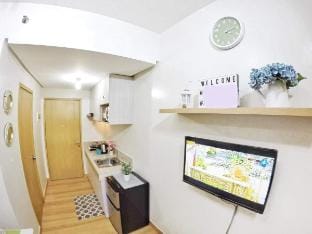 1BR w/ PS4 & Balcony Pool View Vacation rental in Quezon City