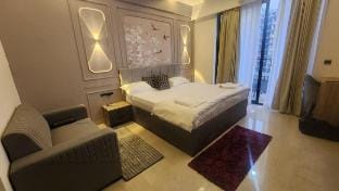 Stay Cool in AC near Ekana Cricket Stadium Apartment in Lucknow