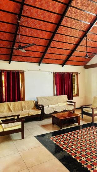 WoodHouse Near Isha and Siruvani Farm Stay in Kerala