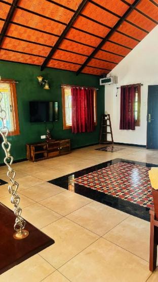 WoodHouse Near Isha and Siruvani Farm Stay in Kerala