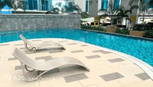Warm Blush Staycation Spot Apartment in Cebu City
