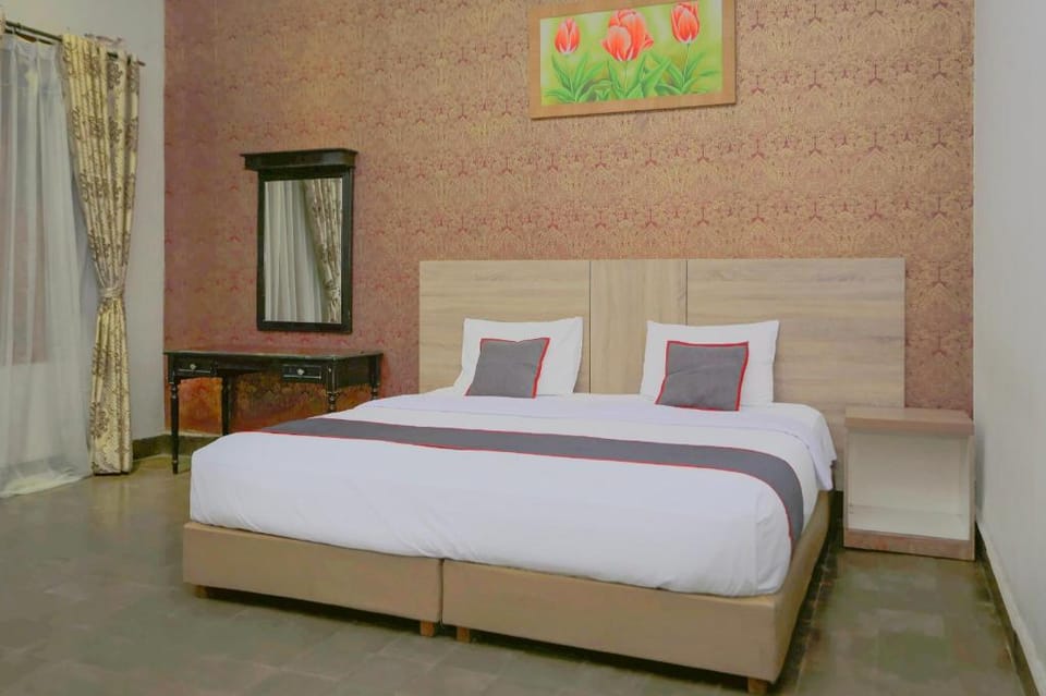 Hotel O Bogor near Kebun Raya Bogor formerly Guest House Saputra Hotel in West Java