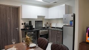 Daraqa-Modern 1BR Apartment in Peaceful Dubai Land Vacation rental in Dubai