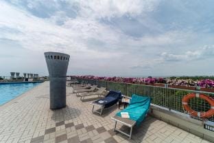 Modern Flat with Solarium and Pools on the Roof Apartment in Bibione