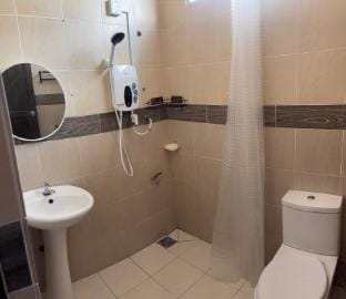 Muslim Homestay - Casa Qhatalia - 10 Pax  Vacation rental in Kuching