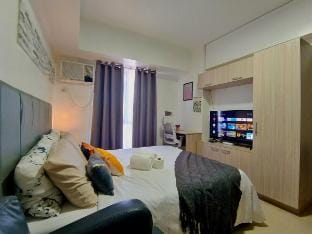 Avida Riala 2414 T1 IT Park Queen Bed 200Mbps WiFi Apartment in Lapu-Lapu City