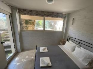 Cassiopeia 2-Beds Lower Apt on Beach with Pool Vacation rental in Chania