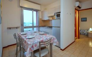 A Charming Holiday Home with Private Terrace in Bibione Apartment in Bibione