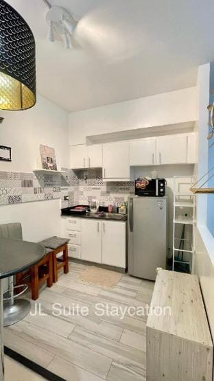 JL Suite Staycation near Venice Grand Canal Mall Vacation rental in Makati