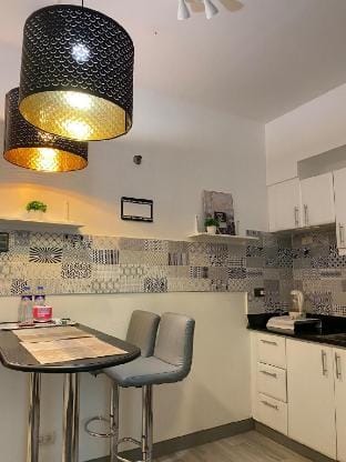 JL Suite Staycation near Venice Grand Canal Mall Vacation rental in Makati