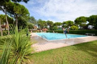 Gorgeous Holiday Home with Pool and Private Garden Apartment in Bibione