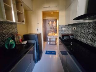 Premium 1bhk furnished flat 22nd floor with Fridge Apartment in Thane
