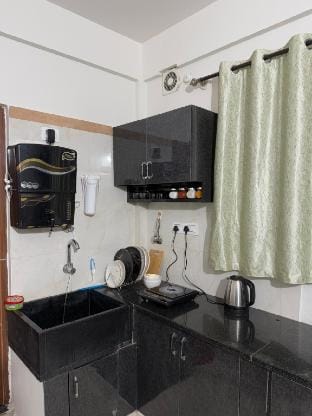 Janni’s Stays Studio Kitchen Perfect for Couples Vacation rental in Bengaluru