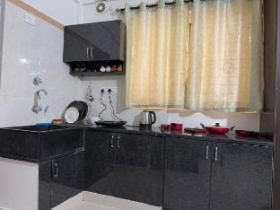 Janni’s Stays Studio Kitchen Perfect for Couples Vacation rental in Bengaluru