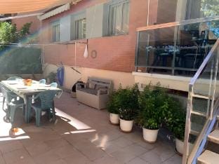 Platanera, ground floor terrce and commun area Apartment in Calafell