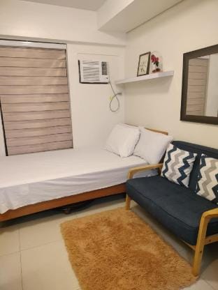 Cozy with Wooden Design Studio for your Staycation Apartment in Quezon City