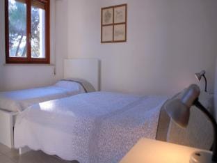 Spacious house with garden and covered parking Apartment in Lignano Sabbiadoro