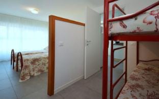 Beachfront Escape for 6  Waves at Your Doorstep Apartment in Bibione