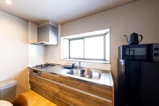 【2025年OPEN】コンビニから3分！駅から10分圏内！プロジェクター完備！１日１組限定貸切一軒家 Vacation rental in Fukuoka